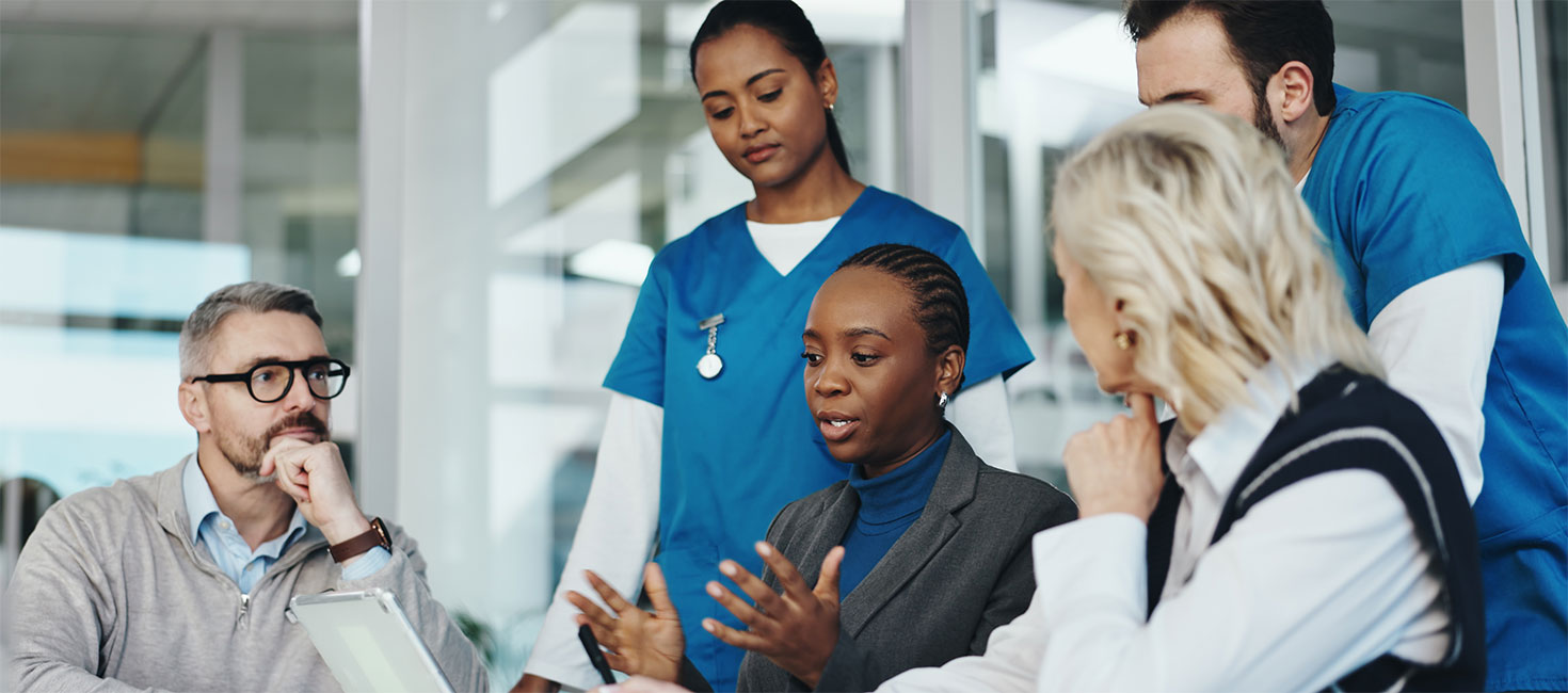 Health Science professionals gathered together in a meeting