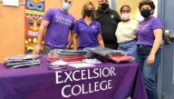 Excelsior University employees at the school supply drop off event